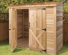 a wooden storage shed with the doors open