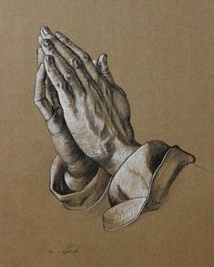 a drawing of two hands folded in prayer