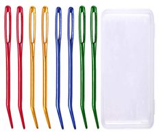 six different colored plastic pens and a white container with one pen in the middle, all lined up next to each other