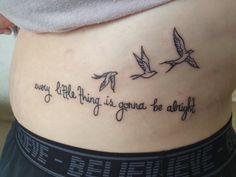 a woman with a tattoo on her stomach that says, my life is going to be alright