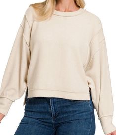 A cozy and stylish addition to your wardrobe that offers both comfort and a trendy look. This sweater features a brushed melange hacci fabric, known for its soft and textured feel, combined with an oversized silhouette exposed-seam sweater with side slits, exposed seam details, hi-low hem, Sweater With Side Slits, Oversized Silhouette, Beige Sweater, Brown Sweater, Oversized Sweater, Brown Beige, Shirts Tops, Wardrobe, Fabric