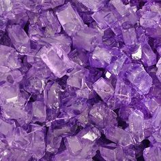 a pile of purple crystals sitting next to each other