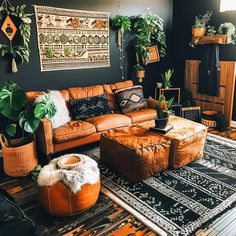 a living room filled with furniture and plants