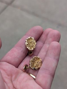 Art Nouveau Gold Face of a Woman Cufflinks. Unmarked and untested, but the posts appear to be rolled rose gold. Couldn't find another pair like this anywhere in searching. There some slight discoloration on the front and back of one of the cufflinks. Sold as is Antique Gold Cufflinks For Collectors, Vintage Engraved Jewelry For Business, Antique Engraved Cufflinks For Wedding, Antique Engraved Cufflinks For Anniversary, Cufflinks Women, Alfonse Mucha, Romantic Gifts For Him, Alfons Mucha, Gold Face