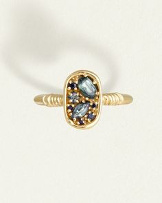 Illume Ring Teal Sapphire Solid Gold – Temple of the Sun US Engagement Rings Handmade, Oval Shaped Engagement Rings, Sapphire Cluster Ring, Gemstone Properties, Teal Sapphire, Rings Handmade, Handmade Engagement Rings, Ring Sapphire, Green Sapphire