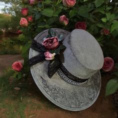 Step into the derby in full style with this Floral Crescent Moon Shape Cordobes Hat. This exquisite accessory combines the timeless charm of a cordobes style hat with the rustic allure of burnt art. Adorned with hand-burned with delicate floral designs, this hat showcases the beauty of nature. Crafted from luxurious beige vegan suede, this hat is as elegant as it is comfortable. The softness of the suede offers a gentle touch against your skin and the elastic band along the inside ensures a cozy fit all day long. Comes with a removable hat band with accessory, use this or customize it further with your own! The elaborate floral artwork on this hat features a stunning array of rose blooms. Make a statement with this burned floral Cordobes hat, whether you're attending a derby, headed to a f Adjustable Flat Brim Costume Hat For Garden Party, Vintage Curved Brim Costume Hats For Races, Victorian Wide Brim Hat For Kentucky Derby, Curved Brim Kentucky Derby Hats, Kentucky Derby Curved Brim Costume Hats, Vintage Costume Hats With Curved Brim For Races, Kentucky Derby Costume Hat With Curved Brim, Victorian Costume Hat With Curved Brim, Kentucky Derby Top Hat With Flat Brim