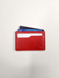 The Slim Wallet is one the most simplistic wallet styles offered. It features three pockets, two on the outside that allow for easy access to cards and one in the middle for stashing cash or more cards. Material: Full-Grain American Leather Dimensions: 3.8in x 2.80in Holds 4-6 cards and some bills. Handcrafted in Alabama, USA -Because leather is an organic material, there will be variations in color & texture from piece to piece. Classic Coin Purse With Card Slots For Personal Use, Casual Rectangular Card Holder With Rfid Blocking, Classic Everyday Card Holder With Rfid Blocking, Classic Trifold Wallet With Card Slots For Everyday, Casual Rfid Blocking Rectangular Card Holder, Classic Rfid Blocking Card Holder For Everyday, Classic Rectangular Card Holder With Cell Phone Pocket, Everyday Use Trifold Card Holder With Card Slots, Classic Card Holder With Cell Phone Pocket