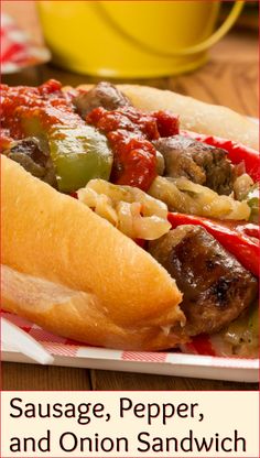 sausage, pepper, and onion sandwich on a plate