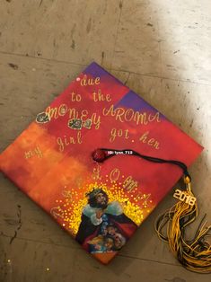 a graduation cap with the words true to the mommy and god got her on it