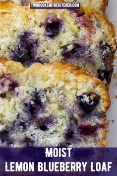 two blueberry muffins sitting on top of a white plate next to each other