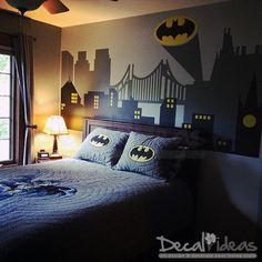 a batman themed bedroom is shown in this image