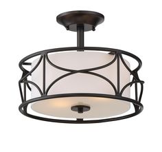 a semi flush ceiling light with a white shade on the top and black metal frame