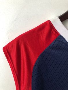 "late 90s converse wide shoulder v-neck jersey tank. deadstock. NWT. navy blue, red & white. white screen printed chest logo. in excellent, unworn condition. it's converse for comfort. 32\" long. 24\" across. legit. legitvintage.etsy.com legitvintage on instagram" Sporty V-neck Top For College, Sporty Tank Top For College In Summer, Sporty Summer Tank Top For College, Cotton Tank Top For College In Summer, 90s Sports T-shirt For Summer, Summer V-neck Streetwear Tops, Sporty Crew Neck Tank Top For College, Sporty Sleeveless Jersey Top, Sleeveless Jersey Sports Top