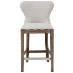 an upholstered bar stool with nail polishing on the legs and backrests