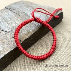 The snake knot braided handmade bracelets feature adjustable to ensure a perfect fit for all wrists. Red Kabbalah Bracelet adjustable snake knot string bracelet handmade minimalist red and blue color options gift pouch Red Circle Jewelry For Gift, Red Circular Jewelry For Gifts, Handmade Adjustable Red Wristband, Handmade Red Adjustable Wristband, Minimalist Red Adjustable Braided Bracelets, Red Adjustable Minimalist Braided Bracelets, Minimalist Adjustable Red Braided Bracelet, Minimalist Adjustable Bangle Wristband, Traditional Hand Wrapped Red Bracelets