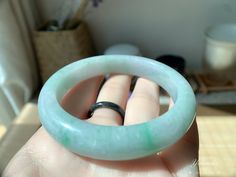 "♡This is a Natural Grade A Burmese (Myanmar) Glutinous with green Jadeite bangle(has a certification in China). ♡Important to know: Have natural stone lines. ♡It's a finished product, you can get the style and color from the picture. ♡ The bangle Size: about Inner diameter 56.6mm，Width12.6mm, thickness8.6mm. ♡Please note the original colors may be a little bit different from what you see on your monitor. ♡the shop preferential policies: 1. All items are free shipping using FedEx (As long as the Handmade Round Jade Bangle, 100 Grade, Tiger Pendant, Baby Bangles, Circle Shape, Burmese, Myanmar, Green Color, Green Colors