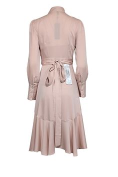 Step into spring in style with this midi-length light pink wrap dress from BCBG Max Azria! Perfect for any special occasion, this chic and playful dress is a must-have for your wardrobe. Wear it with your favorite gold strappy heel for a classic look! Size XXS Shell 100% Polyester Lining 91% Polyester, 9% Spandex Wrap style closure Button closure on wrists Midi length Long sleeve Bust 32" Waist 31" Shoulder to hem 41.5" Sleeve length 25.5" Pink Wrap Dress, Gold Strappy Heels, Pink Wrap, Bcbg Max Azria, French Fashion Designers, Wrap Midi Dress, Max Azria, Pink Long Sleeve, French Fashion