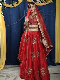 This gorgeous red raw silk bridal lehenga with zardosi and sequins work butti is teamed with a red heavy cutwork blouse. This outfit is completed with a red organza embroidered dupatta.
*Ready to ship in sizes XS, S, M, L Resham Embroidery Lehenga For Traditional Ceremonies, Red Kundan Lehenga With Dupatta, Organza Lehenga With Intricate Embroidery For Traditional Ceremonies, Organza Lehenga With Dupatta For Traditional Ceremonies, Red Kundan Sets With Dupatta, Red Gown With Resham Embroidery For Diwali, Red Gown With Intricate Embroidery And Traditional Drape, Red Silk Thread Lehenga For Navratri, Red Chanderi Lehenga With Intricate Embroidery