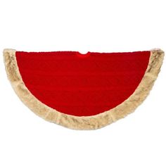 a watermelon shaped rug with fringes on the bottom and sides, sitting against a white background