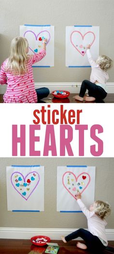 two children playing with sticker hearts on the wall