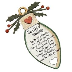 a christmas ornament with a poem written on it and holly leaves hanging from the top