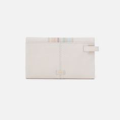 Purposefully designed, the Keen wallet is a minimalist trifold with a wristlet strap that you can easily pull out or tuck away as needed. Keen Continental Wallet in Pebbled Leather  White LARGE WALLET in White | Hobo® White Rfid Blocking Wallets For Everyday, White Rfid Blocking Wallets, White Wallets With Interior Card Slots For Everyday, Minimalist Trifold Wallet For Everyday Use, White Leather Everyday Wallet, Everyday White Leather Wallet, Versatile Trifold Wallet For Everyday Use, Minimalist Wallets For Everyday Use, Versatile Trifold Wallet