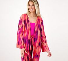 A go-with-the-flow fashion statement with UPF 30 protection, this cascading topper creates a multitude of sunny day styles from a poolside cover up to a lush layer for tanks. From AmberNoon II by Dr. Erum Ilyas. Summer Casual Cover-up For Layering, Versatile Lightweight Spring Tops, Upf 50+ Spring Vacation Cover-up, Spring Vacation Cover-up With Upf 50+, Lightweight Tops For Beach In Spring, Pink Cover-up For Poolside Spring, Multicolor Summer Cover-up For Warm Weather, Pink Cover-up For Spring Poolside Events, Spring Pink Poolside Cover-up