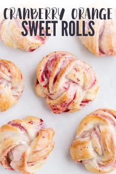 cranberry orange sweet rolls on a white surface with the title text overlay