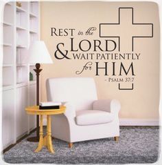 a wall decal that says rest in the lord and wait patiently for him