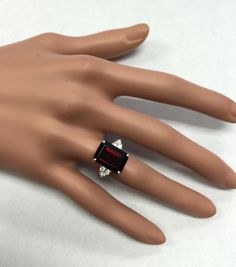 9.25 Carats Natural Impressive Red Garnet and Diamond 14K White Gold Ring Suggested Replacement Value $5000 Total Natural Red Garnet Weight is: 8.95 Carats (VVS) Red Garnet Measures: 13.8 x 9.96mm Natural Round Diamonds Weight: .30 Carats (color F-G / Clarity VS2-SI1) Ring total weight: 6.8 grams Disclaimer: all weights, measurements and colors are approximate and may vary slightly from the listed dimensions or as seen in the image. All pictures are magnified to show the smallest of details. Ple 14k White Gold Ring, White Gold Ring, Multi Stone Ring, Red Garnet, Natural Red, Quality Diamonds, White Gold Rings, Estate Jewelry, Jewellery And Watches