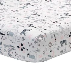 an image of a baby crib sheet with animals on it