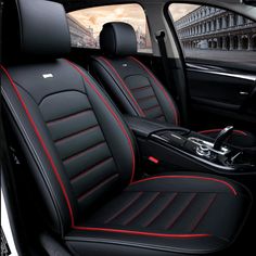 the interior of a car with black leather and red stitching on the front seats