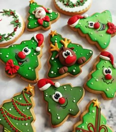 decorated christmas cookies arranged on a table