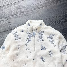 YITAI on Instagram: "I've always wanted to pay homage to my Chinese roots through design, and I was particularly inspired by the blue hues of Fine China Ceramics. This sherpa jacket has delicate embroidery featuring graceful bird motifs and the serene descent of flower blooms, evoking the peaceful imagery of drifting petals. It’s then complemented with a metallic leaf zipper. It took months and four rounds of sampling to perfect." Cat Best Friend, Fizzy Goblet, Tea Clothes, Men Embroidery, Embroidery Men, China Ceramics, Spirit Of God, Design Identity, Delicate Embroidery