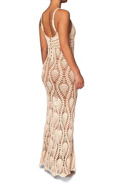 Move from beach to cocktails in this skin-showing crochet maxi designed with a low-dipping neckline and slender adjustable straps. Back button closure V-neck Adjustable straps Lined 100% acrylic Hand wash, dry flat Imported