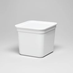 a white square container on a gray background