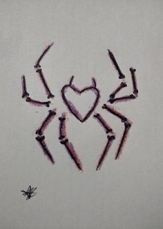 the word love is written in crayon pencils on a white paper with an insect