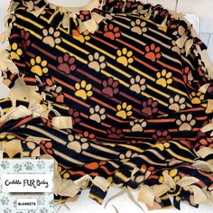 a dog blanket with paw prints on it