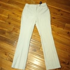 New With Tags Express "Columnist" Barely Boot Mid Rise Pants (With Stretch). Size 6r In Off White & Black Pinstripe 2 Faux Back Pockets 2 Front Pockets Zip Fly With 2 Hook/Eye & 1 Button Closure Barely Bootcut Has Stretch ***** There Is A Smudge Of Dust On Back Left From Storage. As These Are New With Tags I Did Not Try To Remove. Should Launder Right Out. Price Offered Reflects***** Polyester/Cotton/Rayon/Spandex W- 15" L- 41" Inseam- 33" B5 Neutral Pants For Formal Spring Occasions, Cream Formal Bottoms For Fall, Formal Cream Bottoms For Fall, Neutral Formal Pants For Spring, Spring Formal Neutral Pants, Neutral Spring Formal Pants, Cream Stretch Pants For Spring, Cream Stretch Bottoms For Work, Stretch Cream Pants For Work