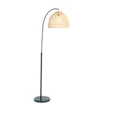 a floor lamp with a white shade on it's head and a black base