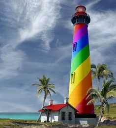 a colorful lighthouse with the words let your gentleness be evidence to all the lord is near