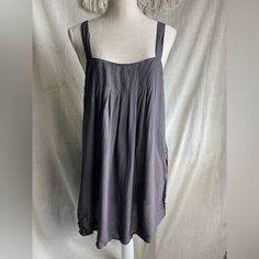 Novella Royale Gray Sleeveless Tie Sides Mini Dress Size P/S Brand New With Tags, No Flaws. Features: Sleeveless, Square Neck, Swim Beach Cover Up, 100% Rayon, Hand Wash Cold, Dark Charcoal / Gray Color, Summer Pit To Pit: 21" Length: 33" Submit An Offer To Purchase And Add 2 Or More Items To A Bundle For 25% Off! Camisole Dress With Built-in Bra For Brunch, Brunch Camisole Dress With Built-in Bra, Summer Sleeveless Slip Dress With Adjustable Straps, Sleeveless Slip Dress With Adjustable Straps For Summer, Sleeveless Sundress With Built-in Bra For Vacation, Summer Cami Mini Dress With Built-in Bra, Casual Sleeveless Mini Dress With Built-in Bra, Sleeveless Slip Dress With Adjustable Straps For Vacation, Sleeveless Slip Dress With Built-in Bra For Summer