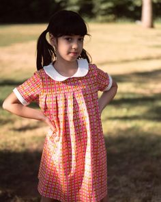 The retro pink plaid pleated peter pan collar dress is the perfect vintage-inspired piece for your little girl. Featuring a vibrant and playful plaid print and the sweetest peter pan collar, your little one will be irresistibly cute. Not only will they look absolutely cute in this timeless piece, they will be so comfortable since it's made from a stretchy cotton spandex blend material. Pan Collar Dress, Peter Pan Collar Dress, Retro Vintage Dresses, Retro Kids, School Dresses, Toddler Girl Dresses, Pink Plaid, Pan Collar, Plaid Print