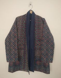 Discover the allure of the Indian Ajrakh Cotton Kantha Jacket, a stunning piece of handcrafted ethnic wear. This stylish jacket combines traditional artisanal craftsmanship with a unique, handmade design. Elevate your wardrobe with this beautiful and distinctive jacket, embodying timeless elegance and cultural richness. Perfect for adding a touch of heritage to any outfit. Kantha Jacket, a true masterpiece crafted with love and expertise. Made from fresh, hand-stitched kantha quilt fabric, this Bohemian Traditional Wear With Bandhani Print, Traditional Long Sleeve Bandhani Print Wear, Traditional Long Sleeve Bandhani Wear, Traditional Multicolor Block Print Outerwear, Bohemian Long Sleeve Handloom Kurta, Traditional Long Sleeve Ikat Print Wear, Bohemian Handloom Traditional Wear, Blue Bohemian Outerwear For Festive Occasions, Folk Style Long Sleeve Handloom Kurta