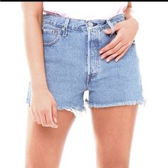 Levi's 501 Original Cutoff Button Fly Jean Shorts S58022 In Light Wash Nwt Size: 27 Color: Blue (Light Wash) Distressed Pocket Hems Cutoffs Raw Hem Button Fly High Rise 5-Pocket Styling 100% Cotton Style # S58022 Measurements Waist: 14" Rise: 12" Inseam: 2.5" Classic Light Wash Short Length Bottoms, Classic Levi's Bottoms With Button Closure, Levi's Casual Shorts With Button Closure, Classic Light Wash Summer Bottoms, Classic Light Wash Bottoms For Summer, Classic Blue Bottoms With Frayed Hem, Levi's Casual Jean Shorts With Button Closure, Levi's Relaxed Fit Bottoms With Button Closure, Classic Cutoff Bottoms For Spring