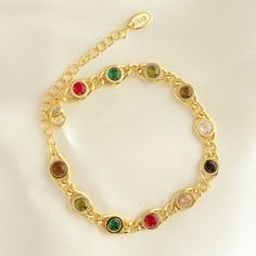 The Havana Bracelet is a stylish and versatile accessory that will elevate any outfit. Made from high-quality materials, this bracelet is durable and long-lasting. With its elegant design and timeless charm, it is sure to impress. Perfect for formal occasions or everyday wear. Elegant Multicolor Gold Bracelet For Formal Occasions, Elegant Multicolor Gold Bracelet For Formal Events, Elegant Metal Bracelets With Jewels, Elegant Multicolor Crystal Bracelet With Jewels, Elegant Multicolor Gold Bangle Bracelet, Adjustable Chain Bangle Bracelet For Party, Party Crystal Bangle Bracelet With Adjustable Chain, Elegant Multicolor Gold-plated Bracelets, Elegant Multicolor Crystal Bracelet For Formal Occasions