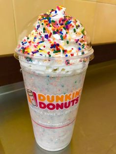 a dunkin donuts ice cream with sprinkles in a plastic cup