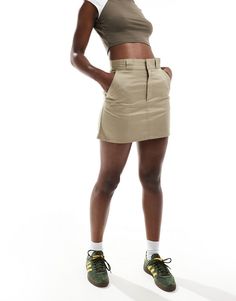 Skirts by Dickies Skirt season: pending High rise Belt loops Functional pockets Logo patch to reverse Regular fit Stretch Mini Cargo Skirt With Pockets, Beige High Waist Mini Skirt With Pockets, Beige High-waist Mini Skirt With Pockets, High Waist Fitted Khaki Cargo Skirt, Khaki High Waist Mini Skirt, Fitted High Waist Khaki Cargo Skirt, Fitted Beige Mini Skirt With Pockets, Stretch Mini Skirt With Side Pockets, Casual High Waist Khaki Skort