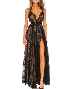 PRICES MAY VARY. Fabric: 95% Polyester+5% Spandex. This maxi dress showcases a beautiful black lace overlay, delivering a romantic and delicate allure. Benefit: Women black evening gown, elegant chic style, the high split design highlights your perfect body curve and makes you look sexier, while allowing for unrestrained movement as you glide through your event. Features: Spaghetti straps maxi dress, onvertible shouldernstraps with back tie closure. The cross-back strap design adds an unexpected Paris Gown, Black Evening Gown, Michael Costello, Spaghetti Strap Maxi Dress, Split Maxi Dress, Revolve Clothing, Guest Dresses, Fitted Dress, Wedding Guest Dress