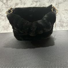 Faux Fur Handbag New With Tags This Is A Great Purse For A Night Out. You Can Also Attach Your Own Strap To Make It A Cute Shoulder Or Crossbody Purse. 6 In Tall 9 In Long 4.5 Inch Wide Chic Evening Bags For Winter, Elegant Evening Bags For Winter, Elegant Winter Evening Bags, Rectangular Shoulder Bag For Winter Evenings, Chic Evening Shoulder Bag With Faux Fur Lining, Winter Evening Bags In Faux Fur, Winter Evening Bag In Faux Fur, Winter Evening Bags With Faux Fur, Trendy Evening Shoulder Bag For Winter